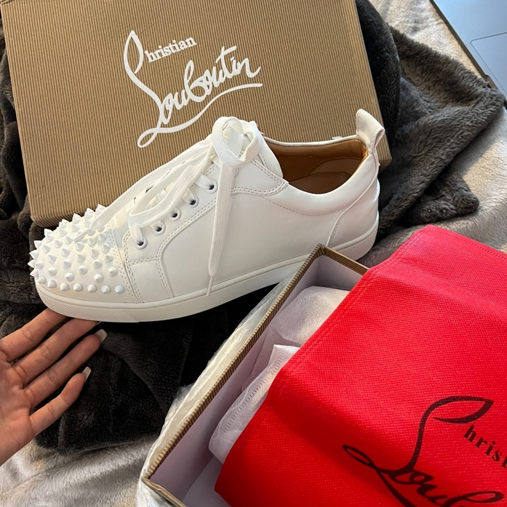 Sold - White spiked louboutin sneakers